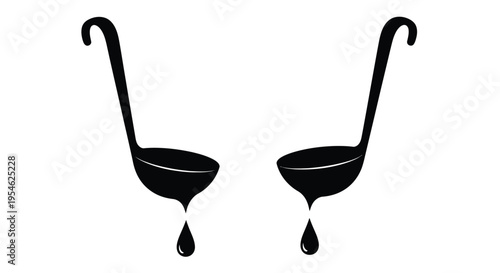 Two black ladles with dripping liquid a striking silhouette