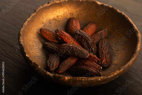 Tonka Beans on Handmade Ceramic Plate