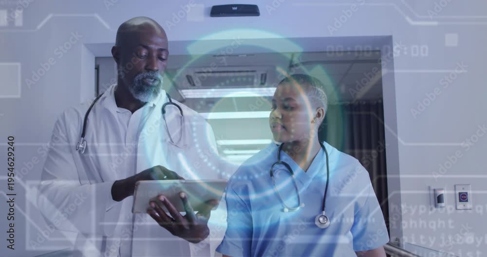 Mature doctor tapping tablet, initiating medical overlay and mentoring ...