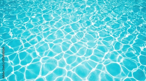 Clear Blue Water Surface with Sunlight Reflections Creating a Serene Pool Atmosphere