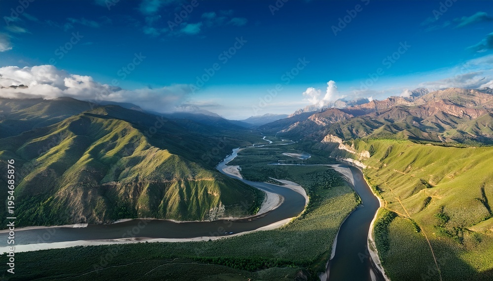 Fototapeta premium Curved River Passing Through A Dramatic Mountain Landscape Seen From Above