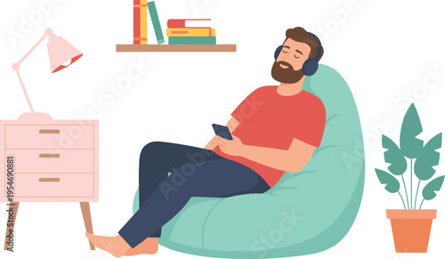 Bearded man wearing headphones relaxing on bean bag chair listening to music with smartphone in modern room.