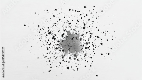 Black Ink Splatter Patterned on White Paper Surface