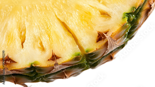 Close up of sweet yellow pineapple slice showcasing its juicy texture and vibrant color, evoking freshness and tropical vibes