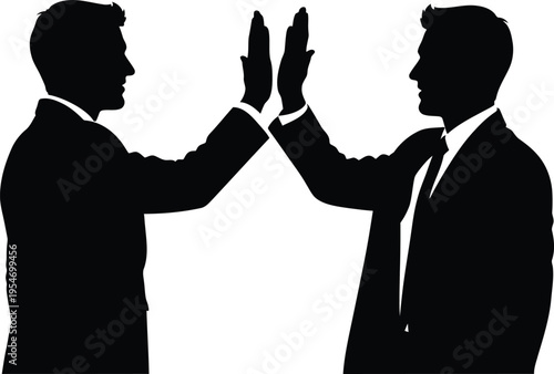 Two businessmen high five silhouette