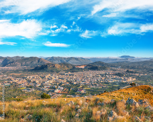фотографія Remarkable morning cityscape of Bagheria town and national park Orientata Pizzo Cane