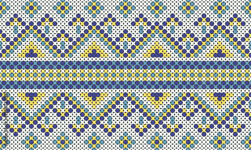 Cross-stitch pattern of blue and yellow stripes on a white background in an ethnic native style.