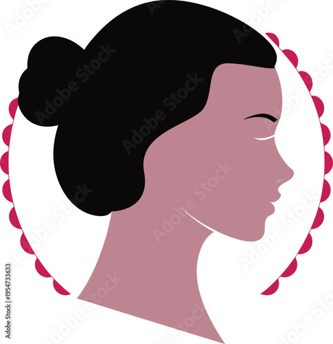 A woman's face from side with hair bun 