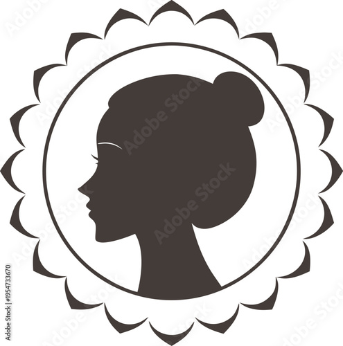 A woman's face from side with hair bun