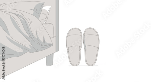 Slip on shoes beside bed.