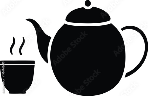 teapot with steam and a matching teacup.