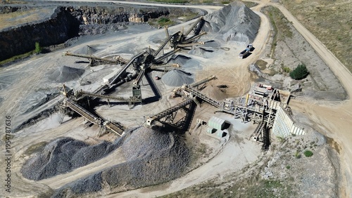Obraz na płótnie Aerial drone view of quarry with conveyor belts and gravel processing plant