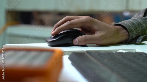 Wallpaper Mural CNC Machine Technician Using A Computer Mouse To Program A Procedure In A Industrial Metal Workshop. Torontodigital.ca