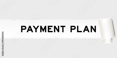 Ripped gray paper background that have word payment plan under torn part