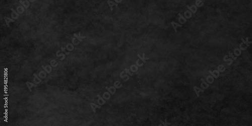 Dark charcoal grunge wall texture background. Dark black rough grunge surface with smoke edge. Black texture chalk board and black board.