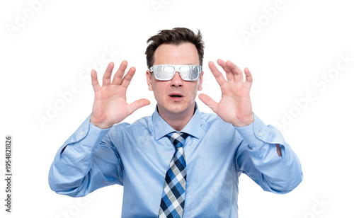 Shocked businessman wearing improvised foil glasses raising hands in fear or stop gesture, funny paranoia concept, conspiracy humor, isolated transparent background png, emotional reaction.