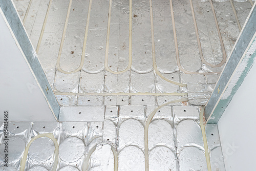 Obraz na płótnie Underfloor heating pipes installing on insulation boards