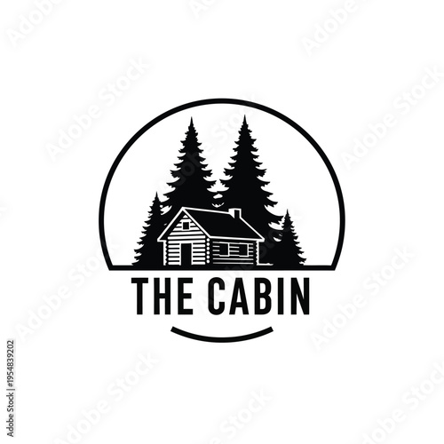 A simple black and white circular logo depicts a rustic cabin nestled among tall evergreen trees