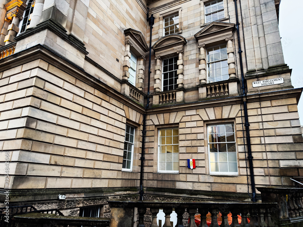 Obraz premium Historic sandstone civic Parliament House building at West Parliament Square in Edinburgh, Scotland UK showcasing classical architecture, balustrades, tall windows and ornate stone facade