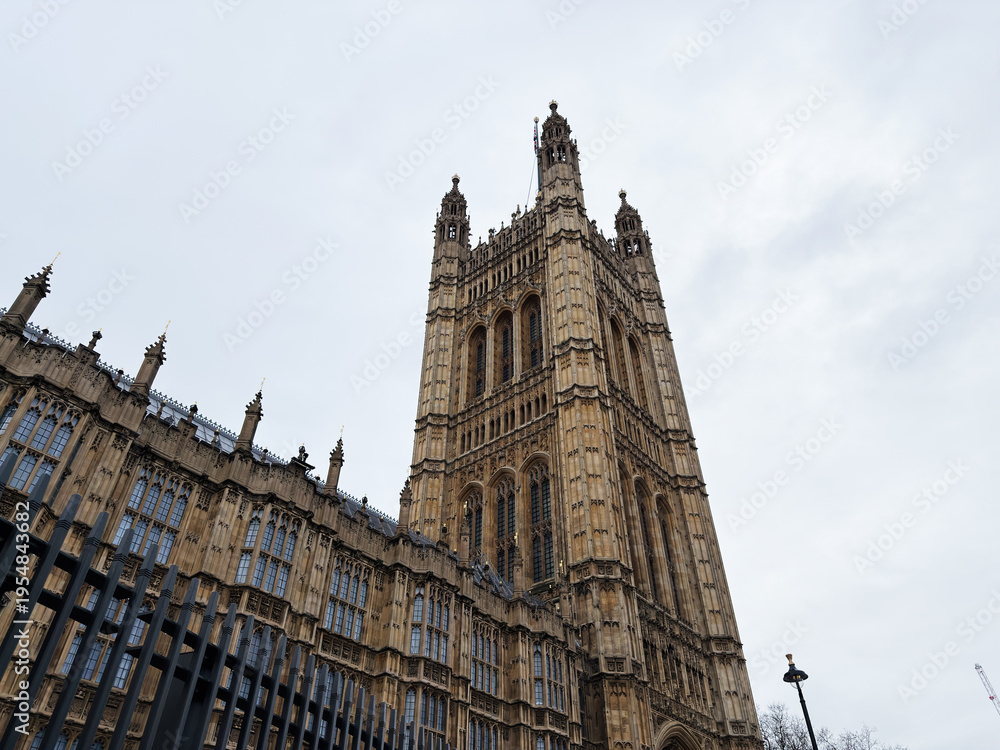 Fototapeta premium Gothic Revival Palace of Westminster tower in London, UK, historic Parliament building and landmark