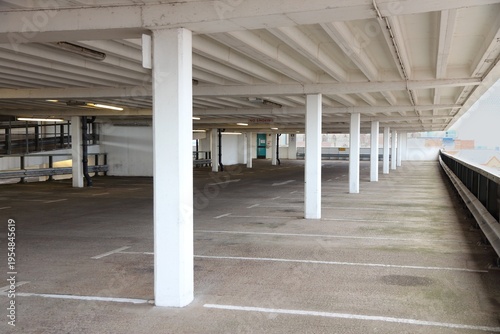 Multi-storey car park interior. Generic parking garage in England.