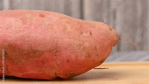 video of a raw sweet potato