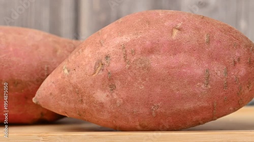 video of a raw sweet potato