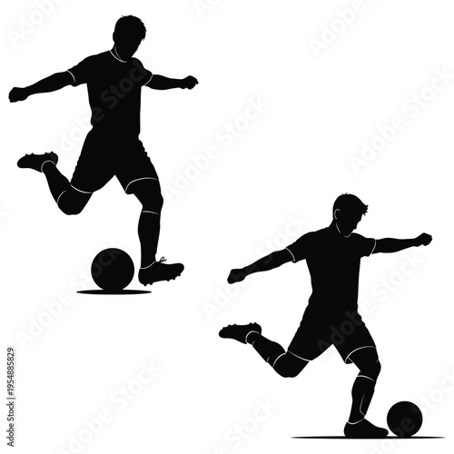 Silhouette of two soccer players kicking a ball