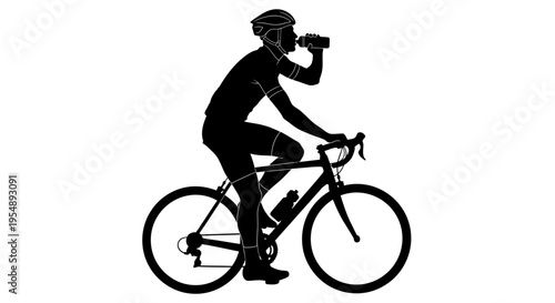 Silhouette of a Cyclist Drinking Water While Riding a Road Bike