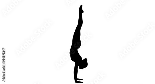 Silhouette of a Flexible Woman Performing a Handstand