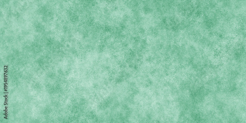 Abstract Elegant dark green background with mottled vintage texture in old fancy background design, texture of colored parchment paper.