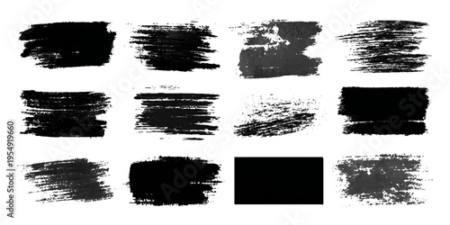 Grungy brush stroke texture set with black paint splashes. ink stains rough artistic background creative design.