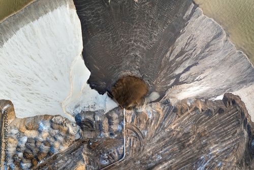 Obraz na plátne Active phosphate mine in Florida with slurry pipeline transporting water, clay and sand from dredging pit