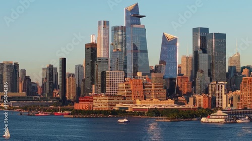 Aerial view of New York City skyline featuring Hudson Yards and landmark skyscrapers along the Hudson River. Summer in Midtown Manhattan 