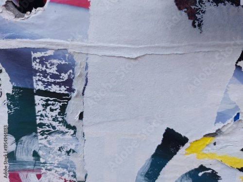 Torn and ripped street poster background, messy and old weathered paper details