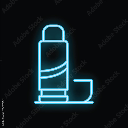 Bright turquoise neon sign of a modern glue stick lying on a surface with its open cap nearby