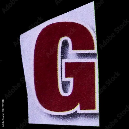 A plain white rectangular sheet of paper, slightly tilted, against a solid black background, creating a stark contrast.