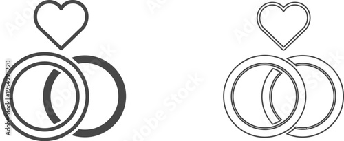 Two interlocking wedding bands are shown beside each other with a simple heart shape positioned directly above them.