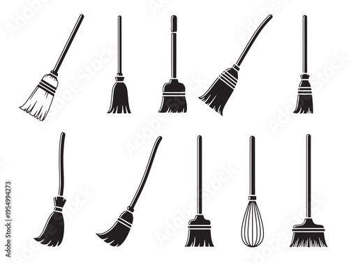 A collection of brooms with different handles and heads