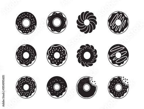 A group of black donuts on a white background