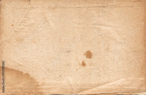 Vintage background of old ancient torn paper texture