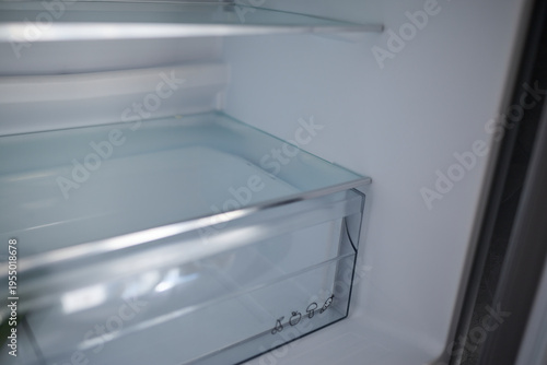 Wallpaper Mural Modern new refrigerator with empty transparent shelves Torontodigital.ca