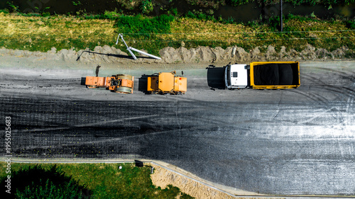 Aerial view on the new asphalt road under construction