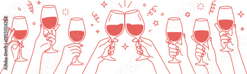 People clinking wine glasses in celebration with festive confetti and sparklers around joyful atmosphere