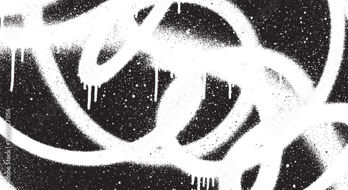 Abstract graffiti spray paint splatter and drip texture on a dark background, grunge urban art background, monochrome design element, black and white