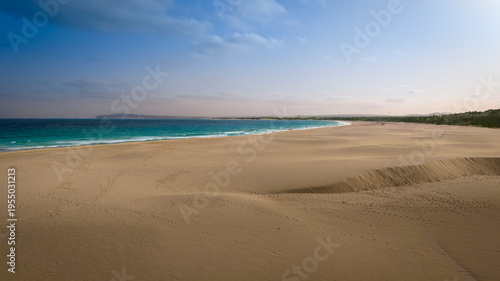 Morro de Areia Natural Reserve is a place of extraordinary beauty and ecological significance,green ocean,sandy beach,desert dunes and luxury resort, Boa Vista island,Cape Verde
