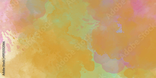 Vibrant Warm Yellow and Orange Abstract Watercolor Background with Artistic Splatters.