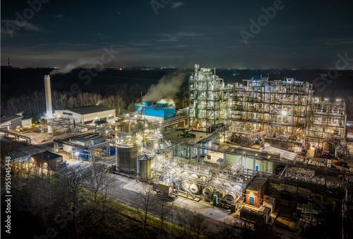 Baronet Works near Warrington in Cheshire, united kingdom. Aerial view at night of the illuminated chemical plant