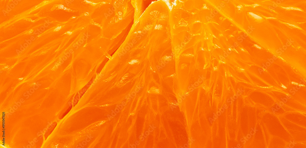 Fototapeta premium Macro Shot of Fresh Juicy Orange Pulp Texture,Extreme close-up macro shot of vibrant orange fruit pulp and segments. The image highlights the detailed texture, juice vesicles, and bright citrus colors
