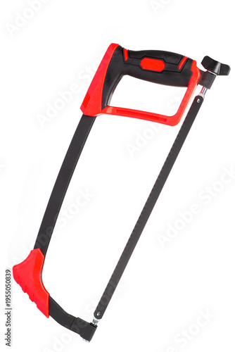 Modern hacksaw with red and black handle isolated on white background. Professional metal cutting hand tool.